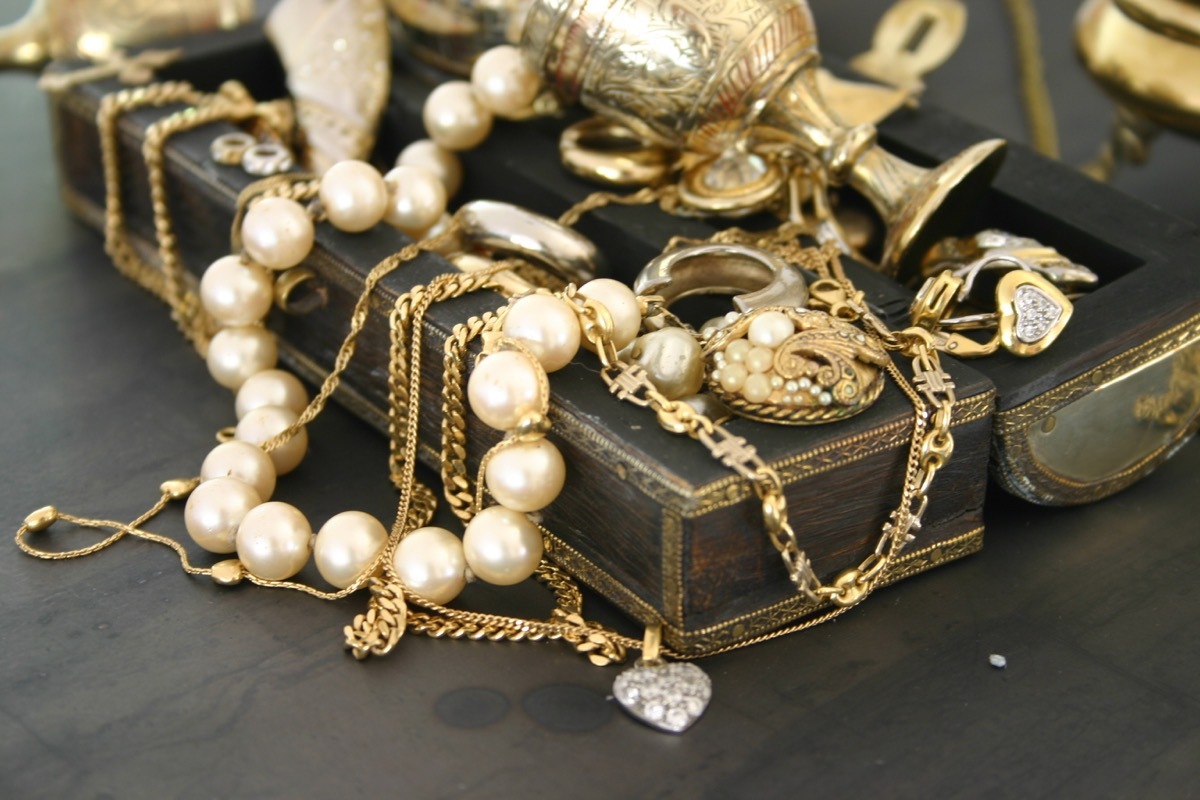 an old jewelry box with necklaces and bracelets, titanic artifacts