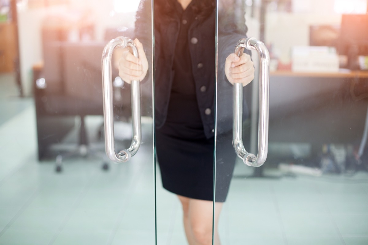 Woman entering a conference room office germs