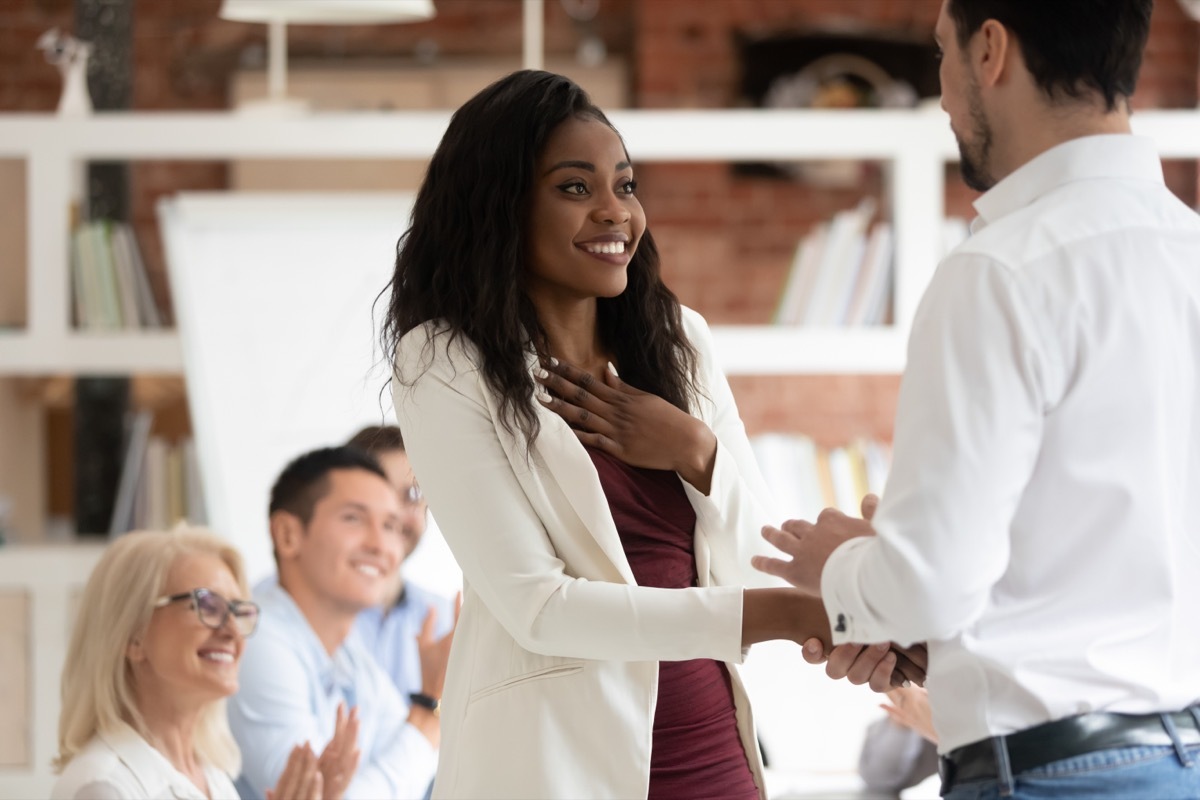 woman receiving a compliment from her boss