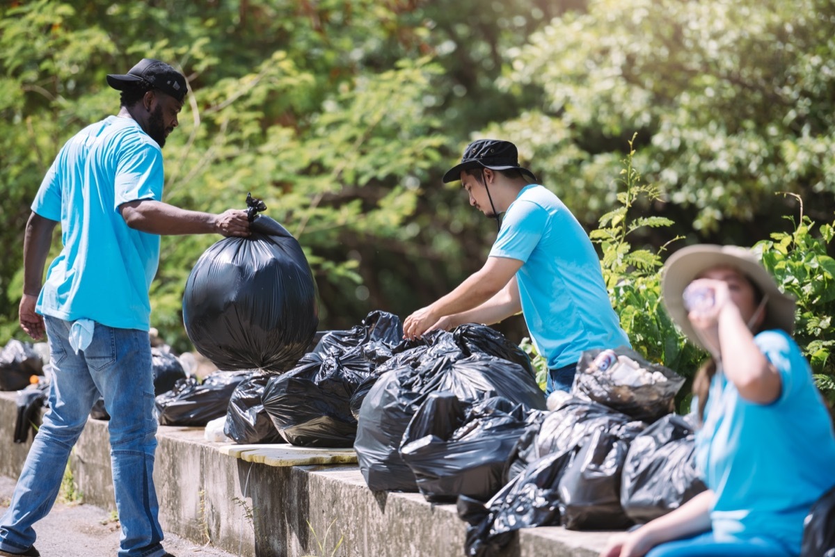 Group of People Collecting Trash