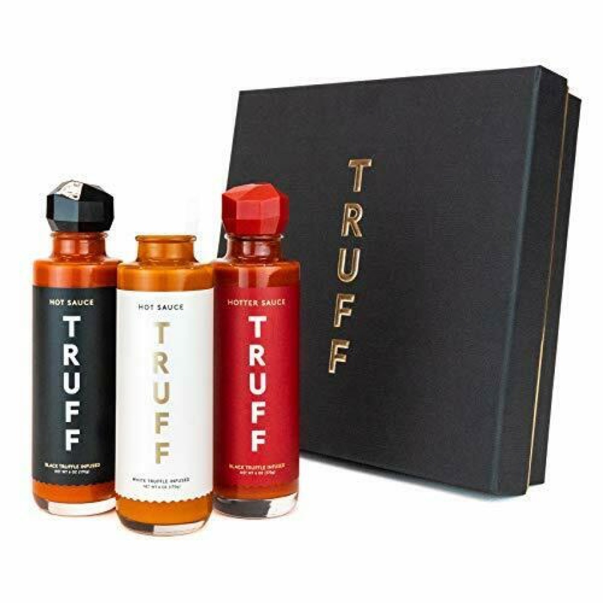 three bottles of truff hot sauce