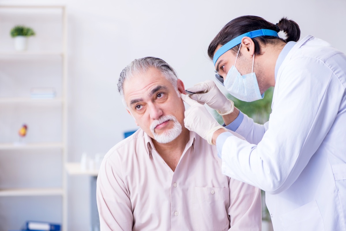 Man having ears checked 