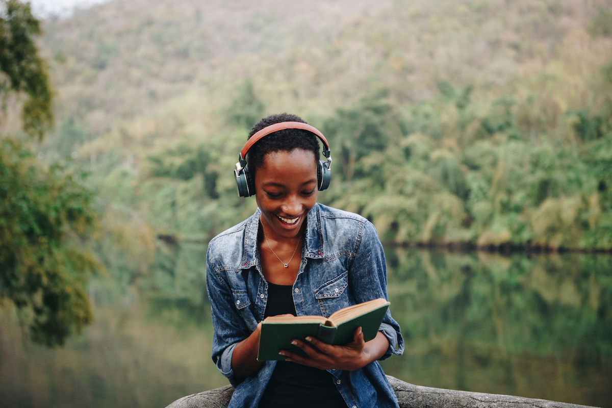 Woman,Listening,To,Music,In,Nature