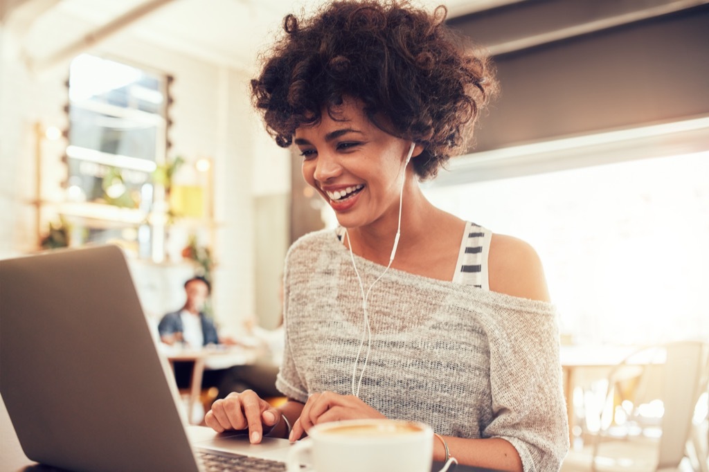 happy woman at computer