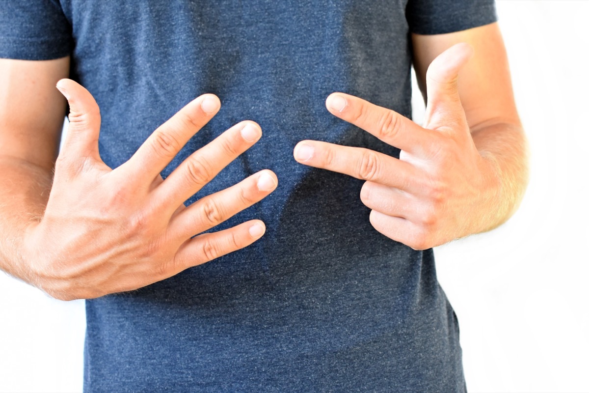 Man doing math and counting on his fingers