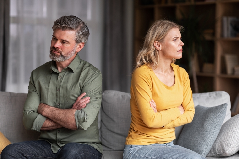 Unhappy middle aged couple fighting or getting a divorce