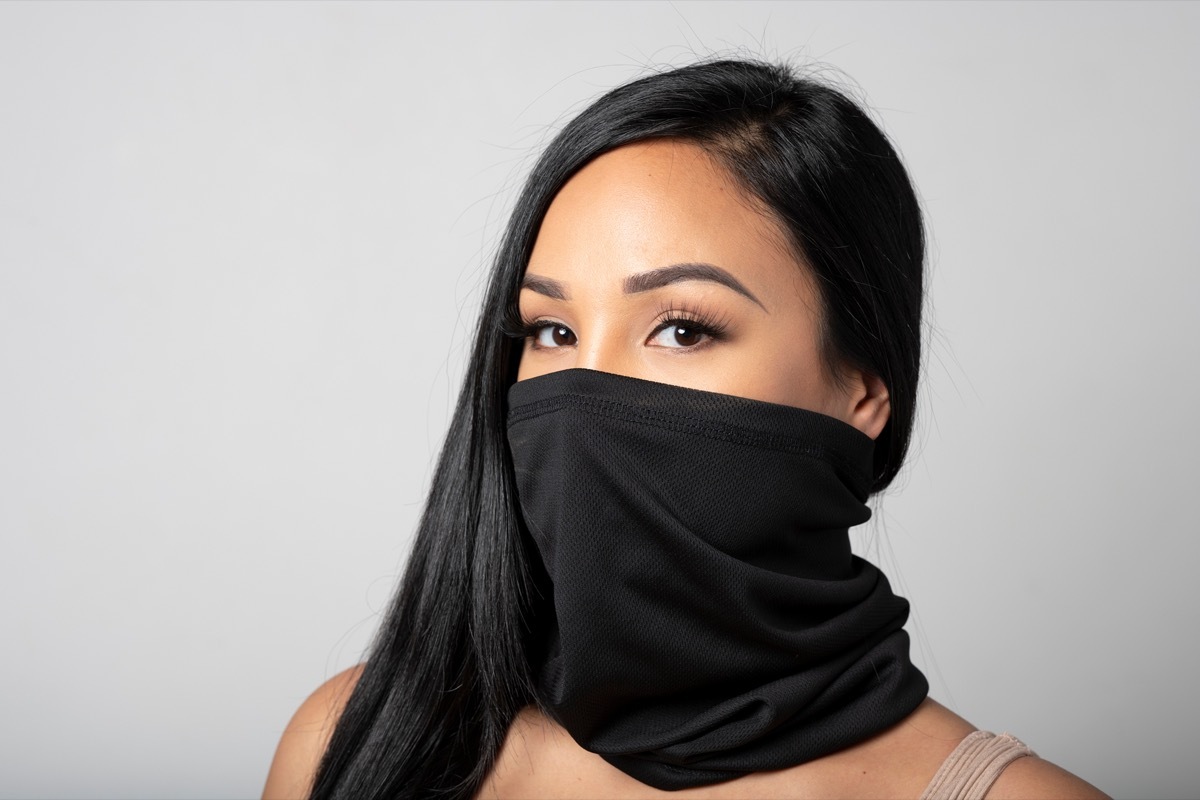 Woman wearing a black gaiter.