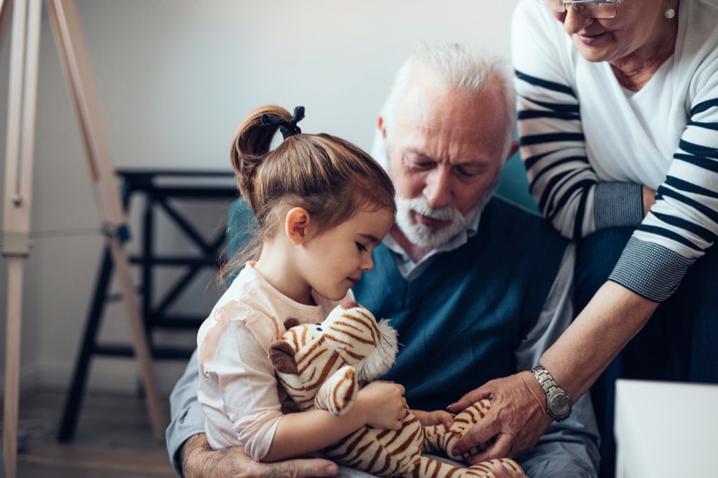 grandpa talking with granddaughter