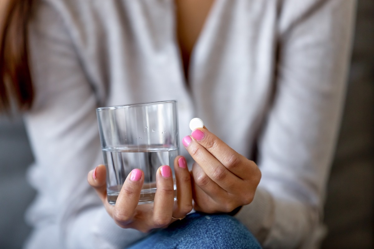 woman holding emergency contraceptive