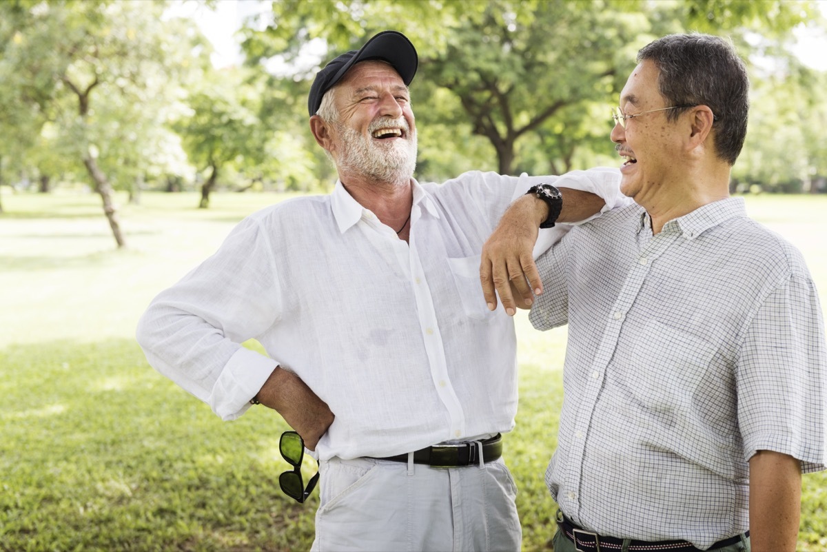 Older friends sharing a laugh