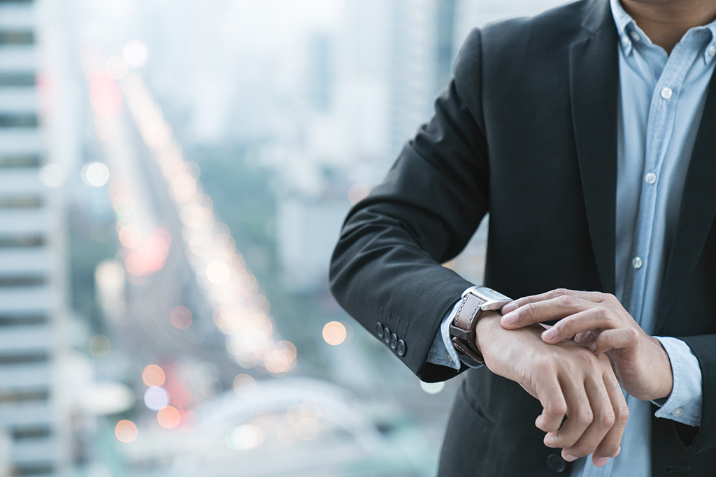 millionaire man looking at watch perfect nap