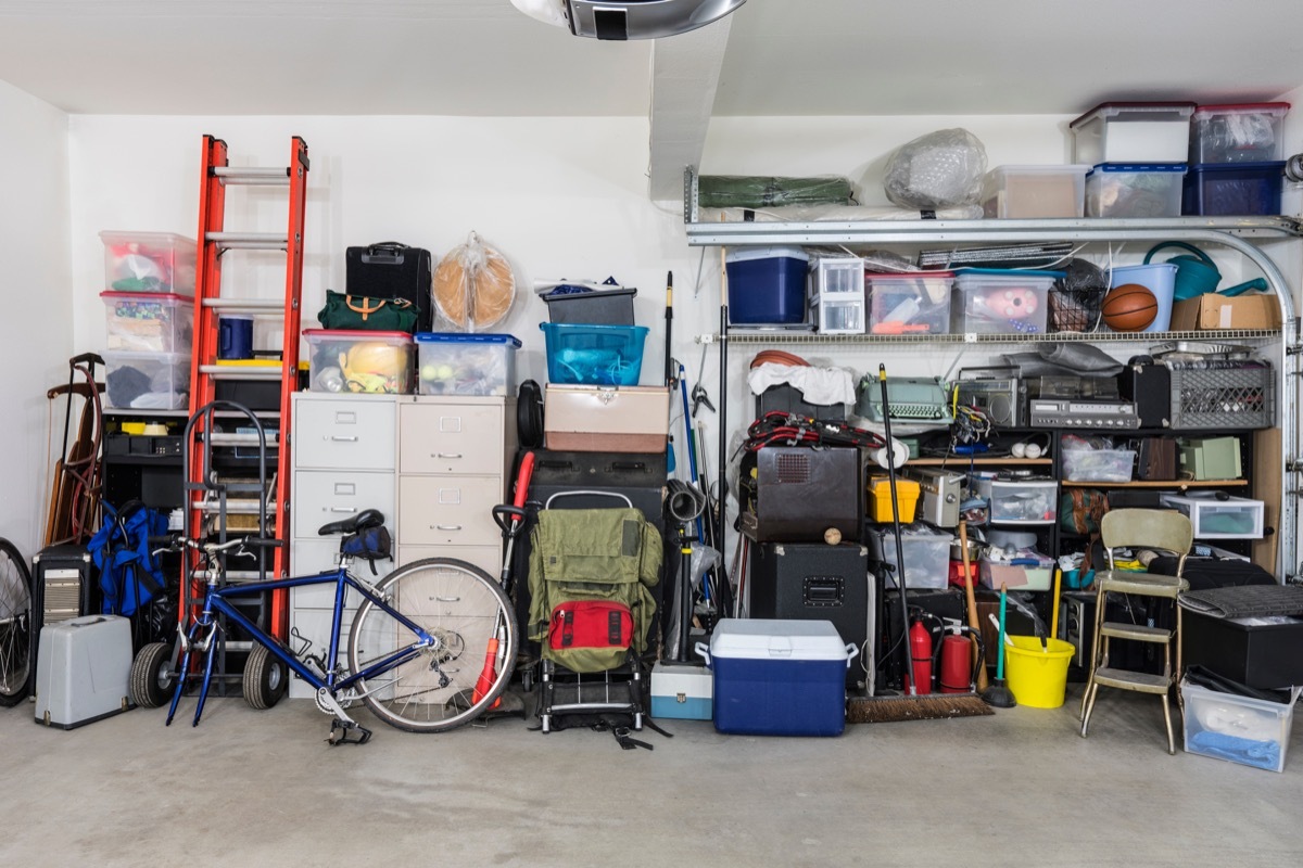 Garage storage shelves with vintage objects and equipment