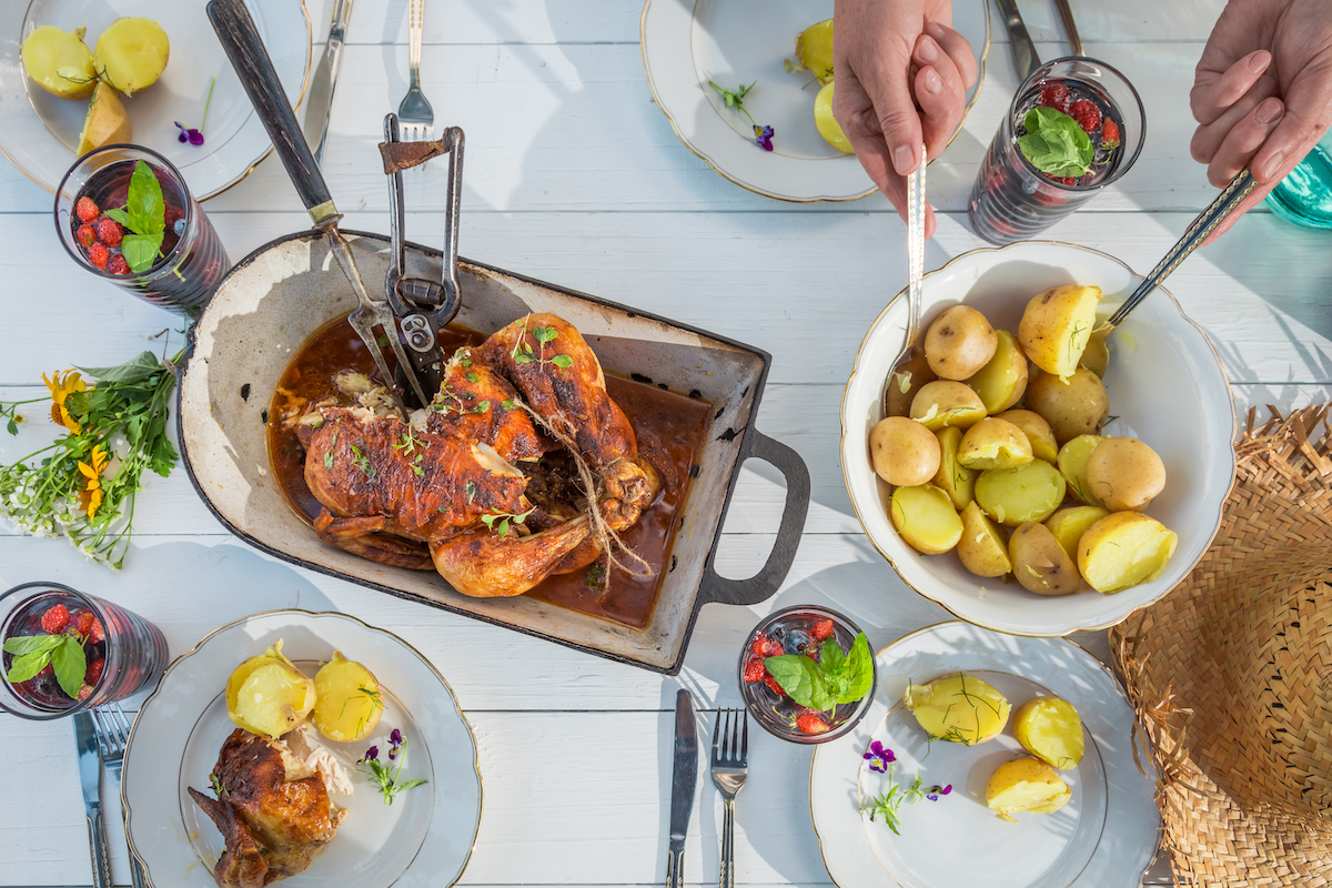 Fresh dinner with potatoes and turkey served outdoors