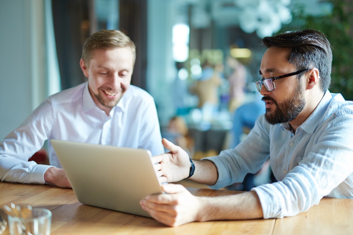 Two Men Discussing Something