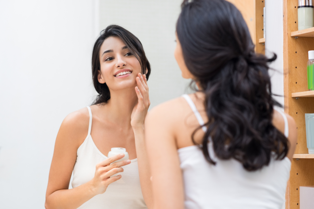 Woman Applying Tretinoin Cream Anti-Aging