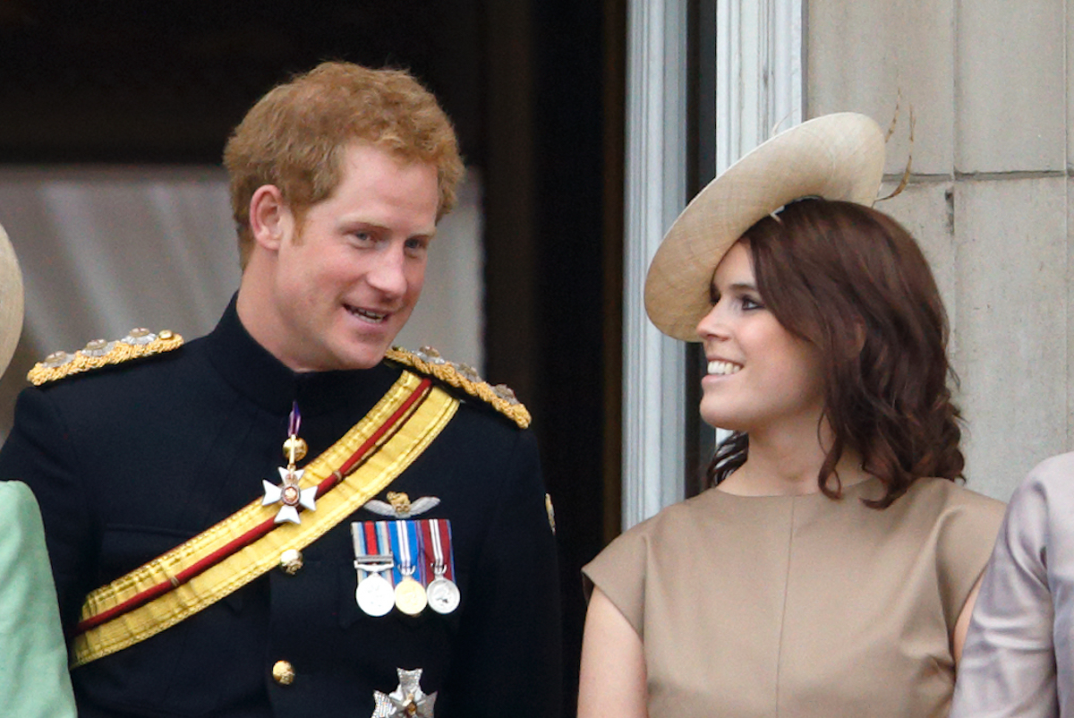 Prince Harry and Princess Eugenie stand on the balcony of Buckingham Palace during Trooping the Colour on June 13, 2015 in London, England.