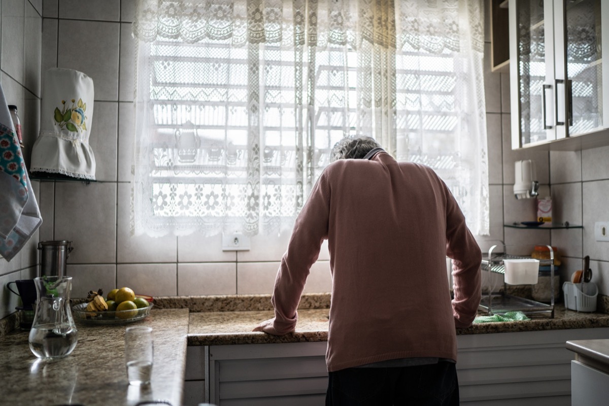 Senior man feeling pain at home