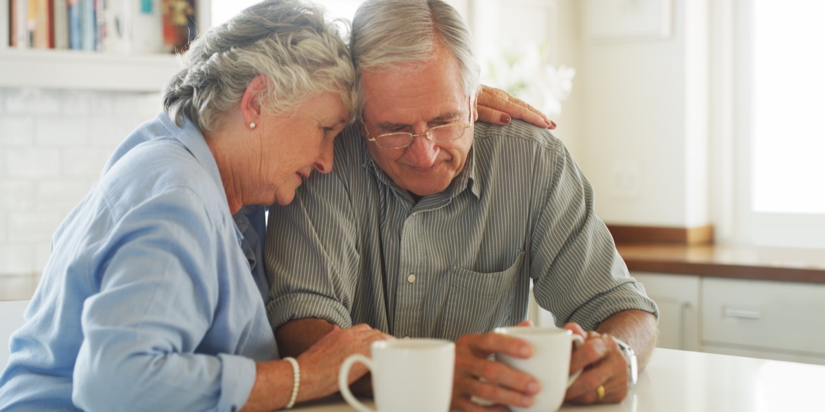 shot of a senior woman comforting her husband at home