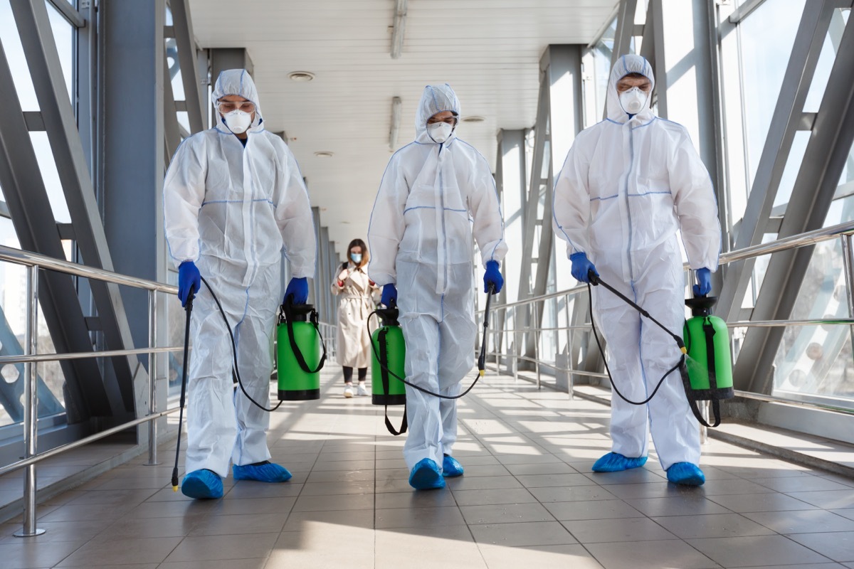 Three People in Hazmat Suits