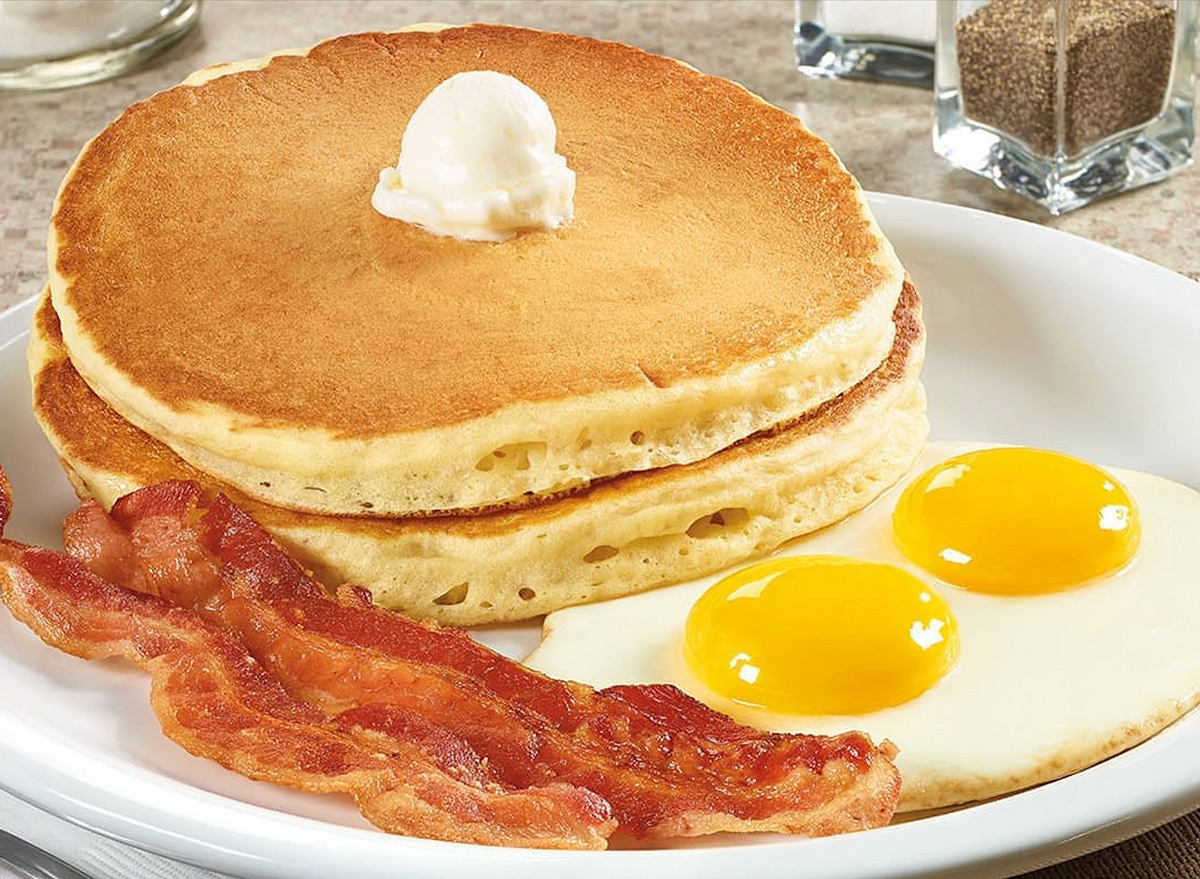 grand slam breakfast at dennys with pancakes bacon and eggs