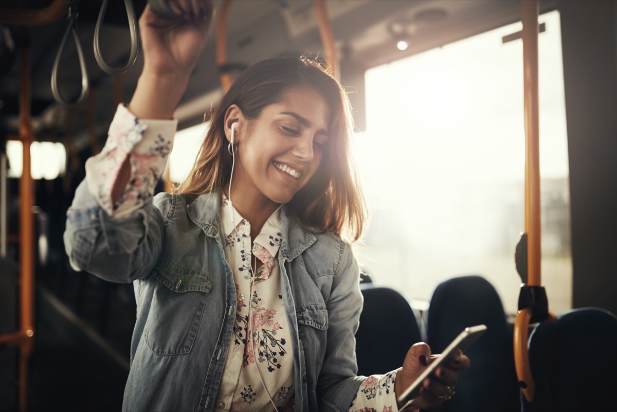 Woman listening to music on her commute to work