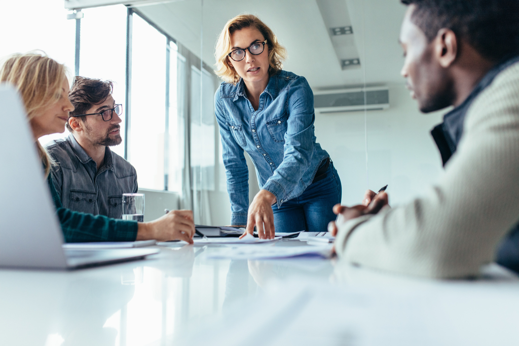 Woman Leading Business Meeting Not Ready to Retire