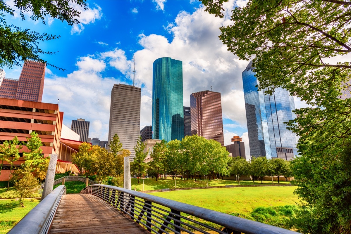 A pedestrian bridge crossing the Buffalo Bayou into downtown Houston Texas.